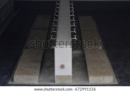 A Muslim men ablution area at a mosque Royalty-Free Stock Photo #672991156