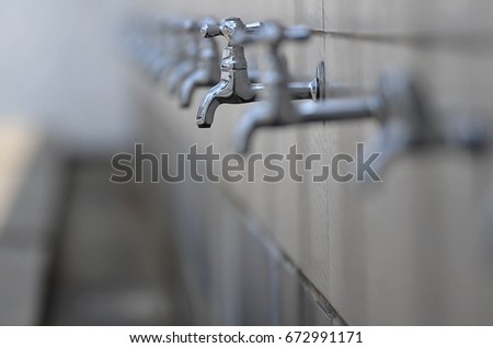 A Muslim men ablution area at a mosque Royalty-Free Stock Photo #672991171