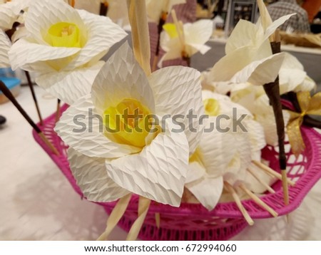 Artificial white flowers for funeral ceremony.
