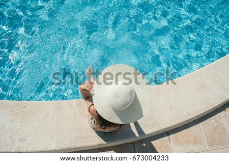 Overview woman on swimming pool