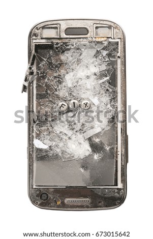 Old broken phone with the inscription FIX made of silver beads on white background. Isolated