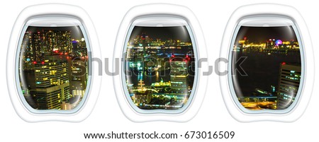 Three porthole frame windows over Tokyo cityscape, the Bay area with its bridges and Odaiba by night from Tokyo World Trade Center, Tokyo, Japan. Closeup of Tokyo cityscape.