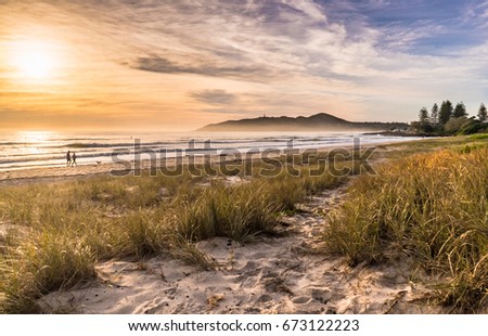 Sunrise on Main Beach, Byron Bay, Australia Royalty-Free Stock Photo #673122223