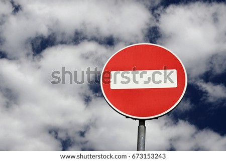 Stop sign against the blue sky background