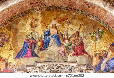 Mosaic of Jesus and his cross from the outside of San Marco Cathedral in Venice, Italy