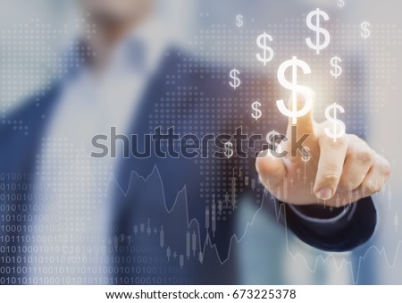 Successful international financial investment concept with business person showing growth, charts and dollar sign, digital technology Royalty-Free Stock Photo #673225378