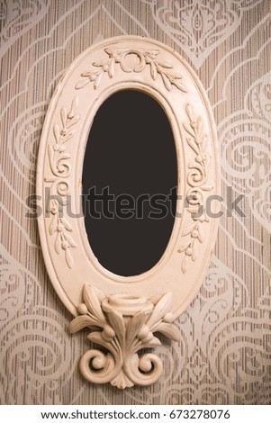 Ancient vintage frames for pictures or photos on the wall. Frames for photographs or paintings in the style of the Renaissance