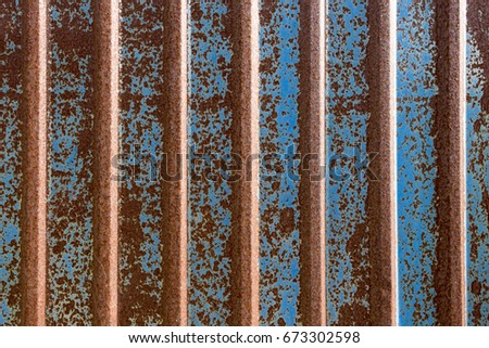 Rusted dark blue zinc sheet wall texture pattern abstract background can be use as wall paper screen saver brochure cover page or for presentation background also have copy space for text.
