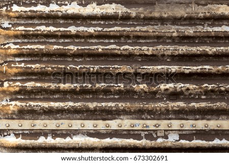 Red brown rusted steel wall texture pattern abstract background can be use as wall paper screen saver brochure cover page or for presentation background also have copy space for text.

