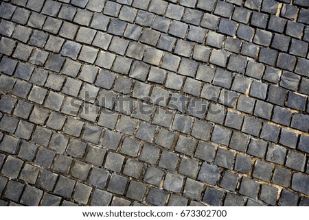 Dark grey with brown stone floor texture pattern abstract background can be use as wall paper screen saver brochure cover page or for presentation background also have copy space for text.
