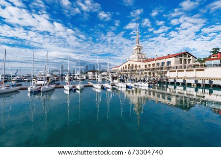 Yachts and boats anchored in the port of Sochi. Russia. Royalty-Free Stock Photo #673304740