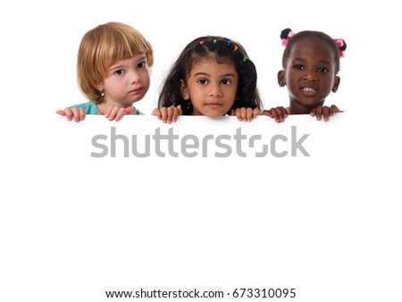 Group of multiracial kids portrait in studio with white board.Isolated
