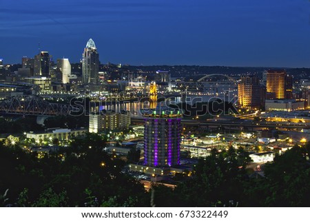 The Cincinnati, Ohio and covington, Kentucky skylines along the waterfront of the Ohio River