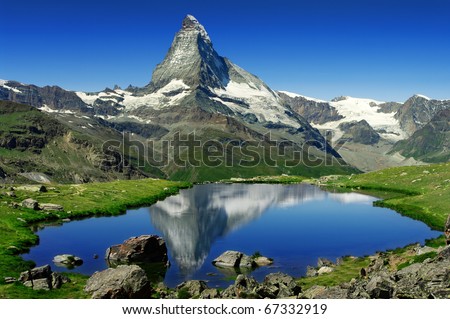 Matterhorn behind a beautiful lake Royalty-Free Stock Photo #67332919