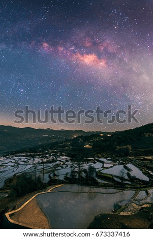 The milky way landscape in China over rice terraced,noise and grain picture style