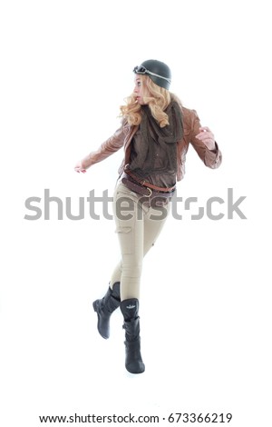 young blonde adventure  woman in a steampunk outfit, action hero pose. isolated on white background.