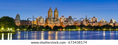 Panoramic view of Central Park West at dawn and the Jacqueline Kennedy Onassis Reservoir. Upper West Side, Manhattan, New York City Royalty-Free Stock Photo #673438174
