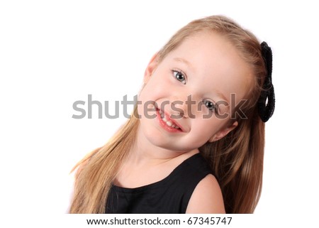 Cute little smiling girl with sparkly sequin bow in her hair on a white background
