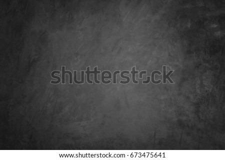 Dark concrete textured wall background.cement wall texture for interior design. dark edges.copy space for add text.