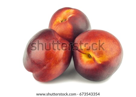 Tasty ripe peaches isolated on white background