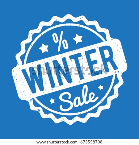 Winter Sale rubber stamp white on a blue background.