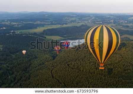 Balloon in Auvergne , Puy de Dome, France  Royalty-Free Stock Photo #673593796