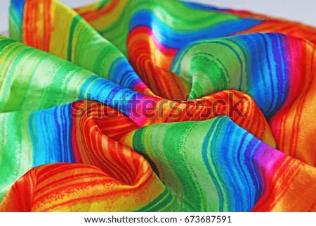 Rainbow colored scarf.