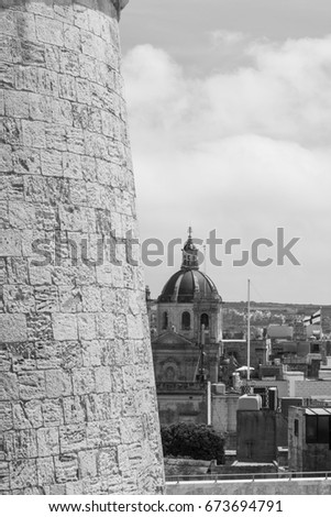 Victoria also known among the native Maltese as Rabat on island Gozo. View from Citadel to baroque Cathedral. Black and white picture