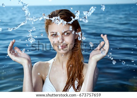 Woman at the sea, spray                               