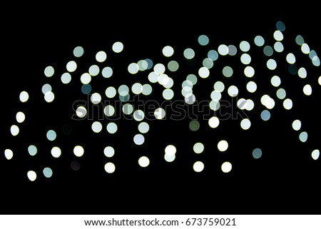 The abstract defocused photo showing of vintage blue light circle Bokeh or blur arts patterns for celebration texture and background