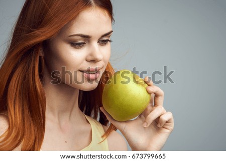 Woman with apple, eating properly                               