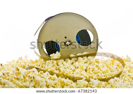 film reel in popcorn isolated on white