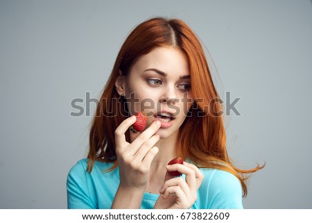 Woman with strawberry                               