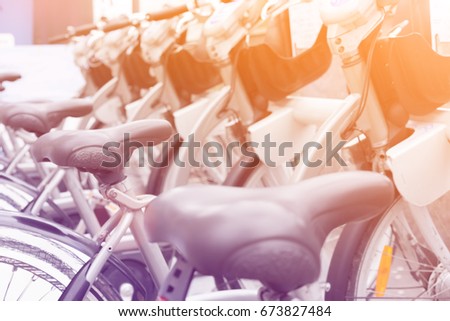 A group of bikes with warm sunny toned