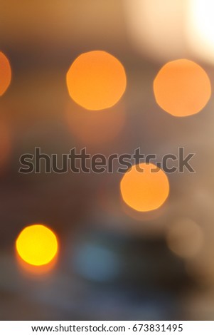 Abstract blur background with round bright lights.