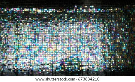 The rainbow mosaic under the water poll.