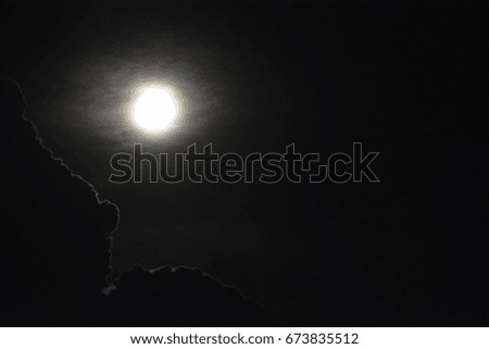 Cloud illuminated by moonlight
