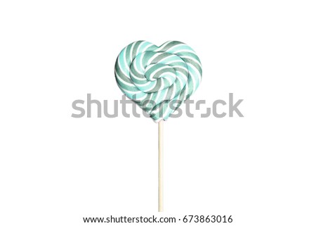big Lollipop in the shape of a heart on the white background