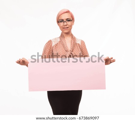 Young happy woman portrait of a confident businesswoman showing presentation, pointing placard background. Ideal for banners, registration forms, presentation, landings, presenting concept.
