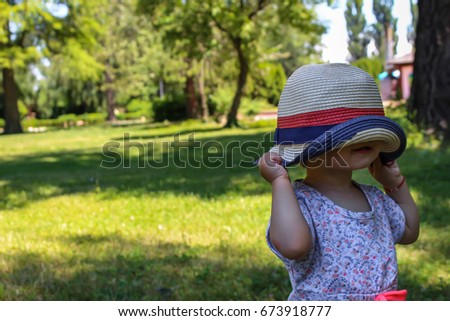 Baby wearing a modern hat