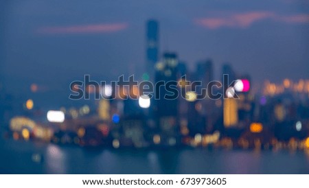 Aerial view blurred bokeh Hong Kong city building light night view, abstract background