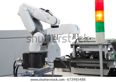 Robotic picking printed circuit board in electronic industry isolated on white background with clipping path