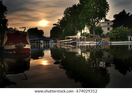 Sunset by canal in Maida Vale, London Royalty-Free Stock Photo #674029312