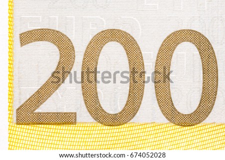 Photographed number in two hundred banknote euro. High resolution photo.