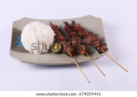 Pork Barbecue with Rice and kalamansi fruit