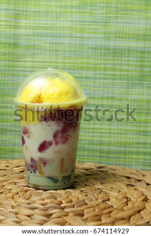 HaluHalo or Halo-Halo on container is a traditional Filipino cold dessert with many sweet ingredients usually popular in summer and hot seasons. The name literally means mixed together in english.