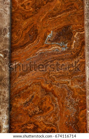 Natural marble. Beautiful decorative marble texture. Deep bright sinuous inner pattern of polished treated surface natural marble. Fashionable marble background for wallpaper, posters, cards, websites