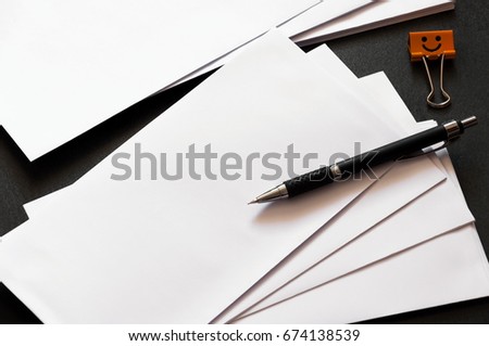 Blank stationery on a modern black concrete texture. Mock Up for branding, graphic designers presentations and portfolios. Corporate identity template. Top view. 