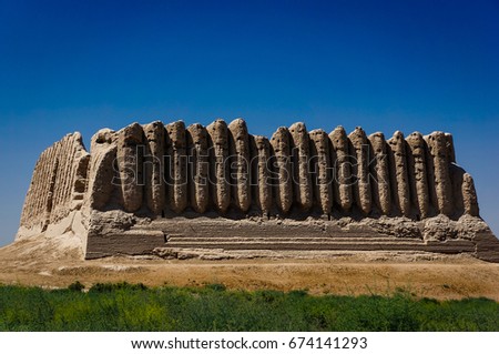 Side View of Great Kyz Qala or ‘Kiz Kala’ (Maiden’s Castle) the Historical Site in Ancient Merv, Southeastern of Turkmenistan. Royalty-Free Stock Photo #674141293