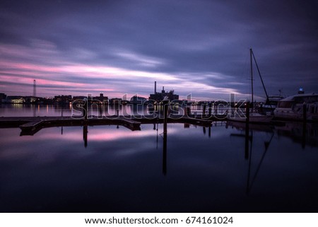 Reflection of a sunset in the Baltimore Harbor.
